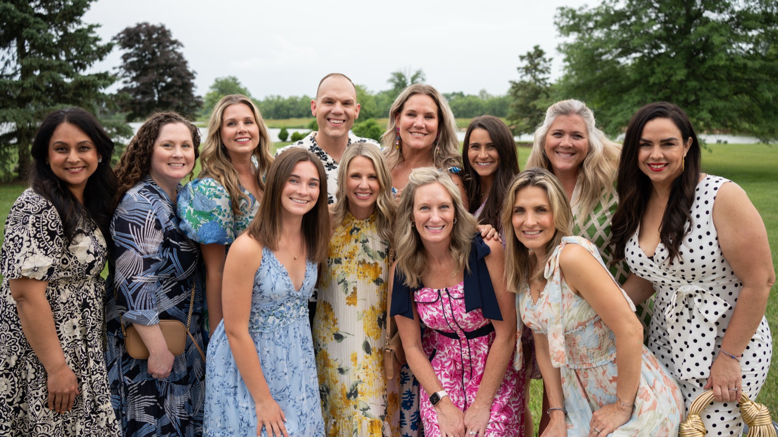 Guests gathered on the lawn at The Agency Indianapolis event