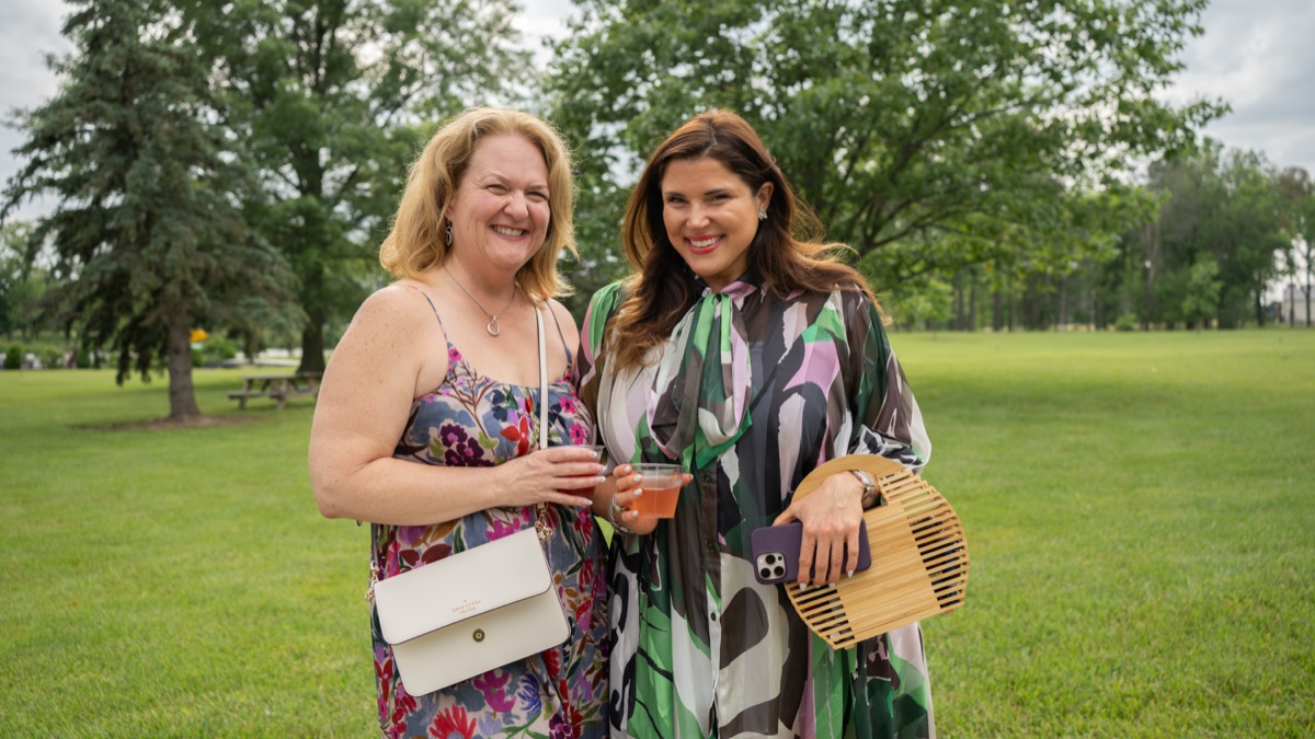 Guests on the lawn at The Agency Indianapolis event