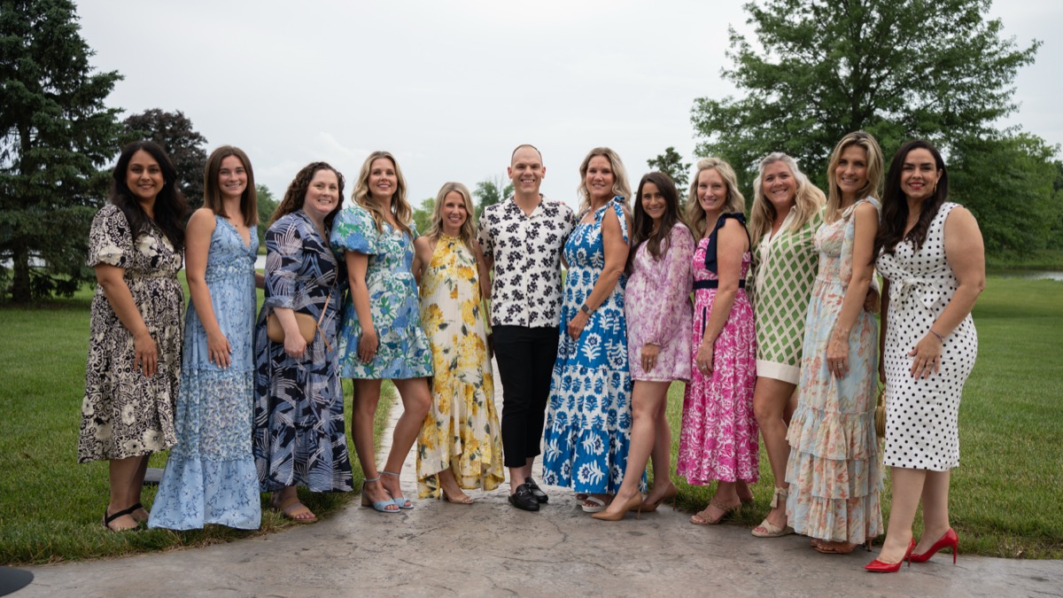 The Agency team gathered outdoors