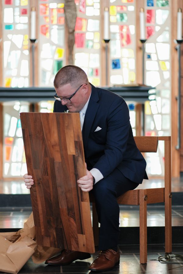 Eric discovering the engraved wooden board