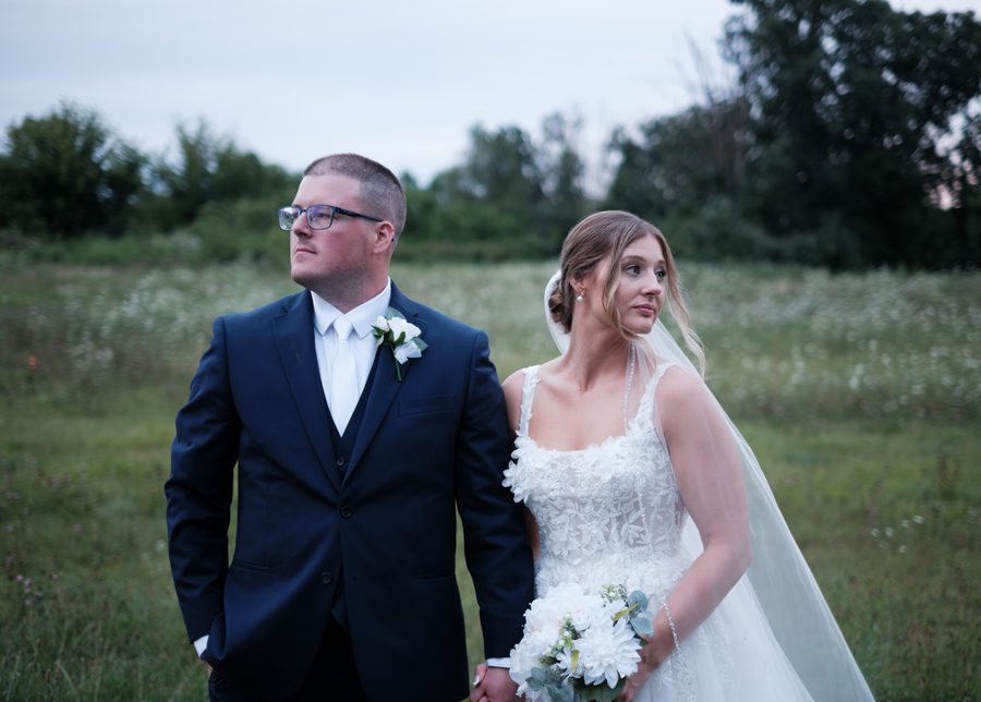Alyssa and Eric in the field at blue hour