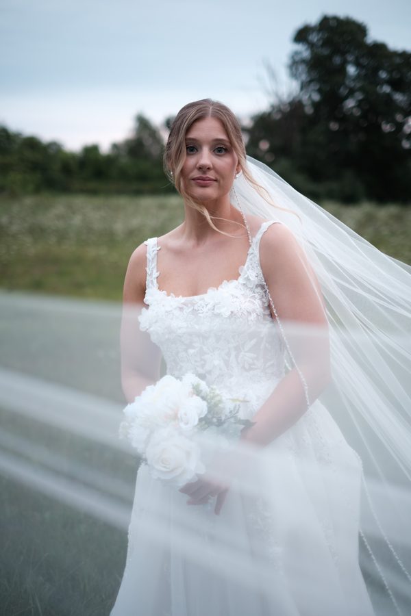 Alyssa with her veil sweeping across the frame