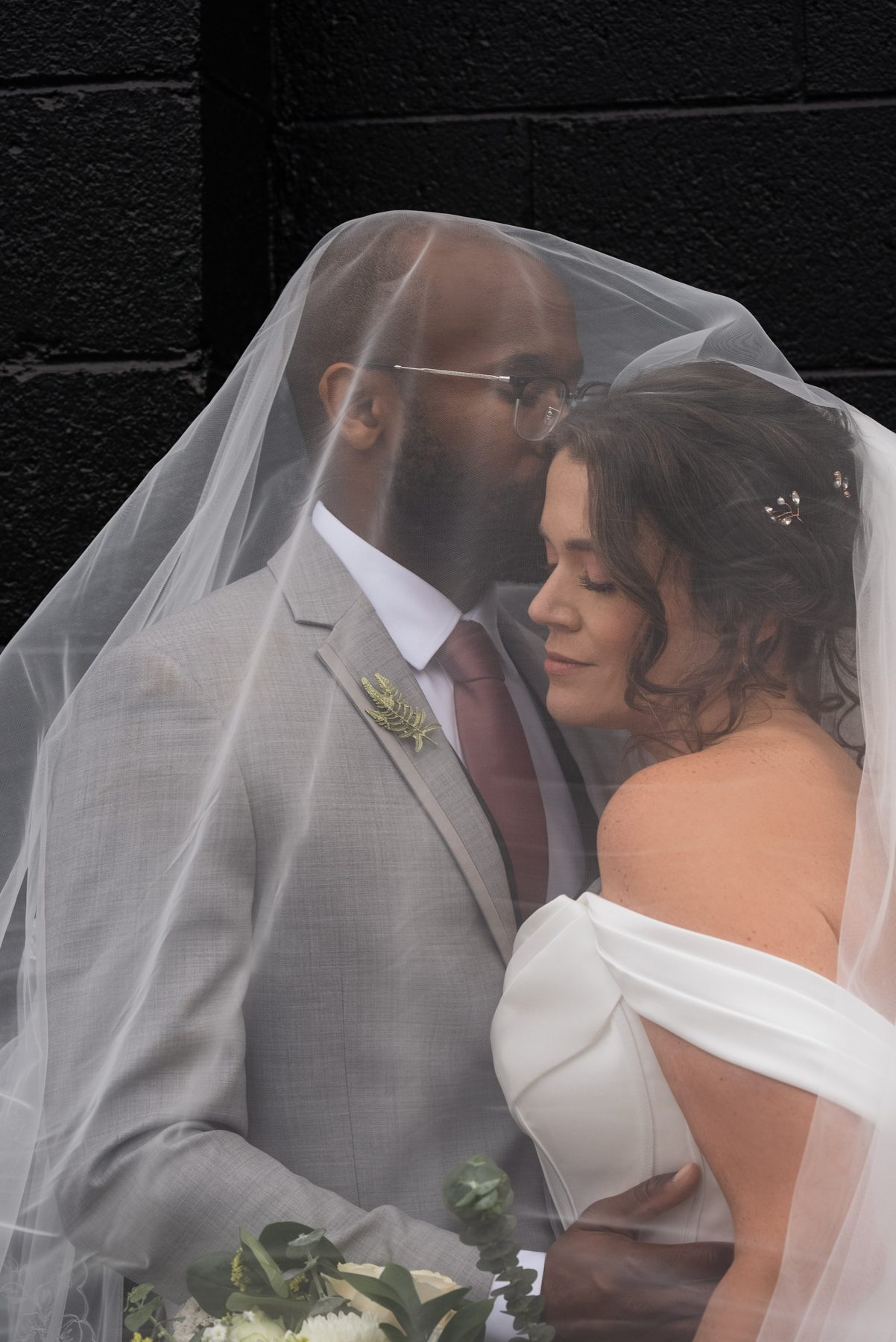 Pary and Edward under the veil